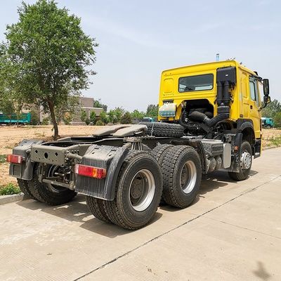 シノトルク HOWO 6X4 トレーラーヘッド トラック価格 9 トンの前軸 6800*2500*3200mm