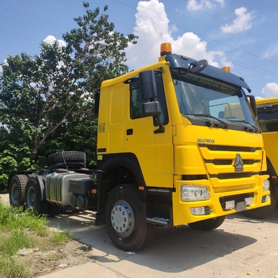 Hw76 キャビンのHOWO あなたの予算内で6800*2500*3200mmのために3軸6X4のトラクターヘッドを使用