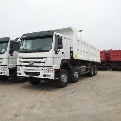 Hw76 キャビ Sinotruk HOWO 8X4 12ホイール トンパー トラック フロントリフティング 5600X2300X1500 20cbm