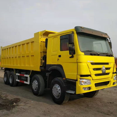シノトルク HOWO 8X4 371HP マニュアルトランスミッション型の中古黄色のダンプトラック