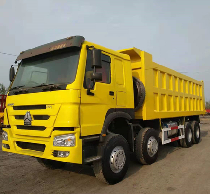 シノトルク HOWO 8X4 371HP マニュアルトランスミッション型の中古黄色のダンプトラック