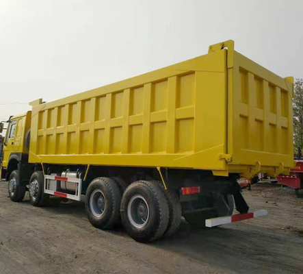 シノトルク HOWO 8X4 371HP マニュアルトランスミッション型の中古黄色のダンプトラック